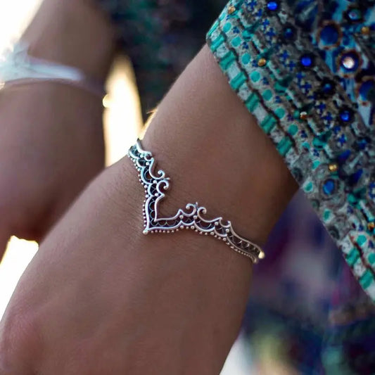 Vintage Tribal Cuff Bracelet - Adjustable bangle showcasing exquisite tribal patterns, ideal for versatile styling.