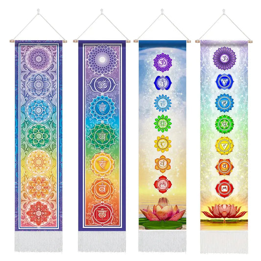 Set of four colorful chakra banners with symbols and lotus flowers on a white background.