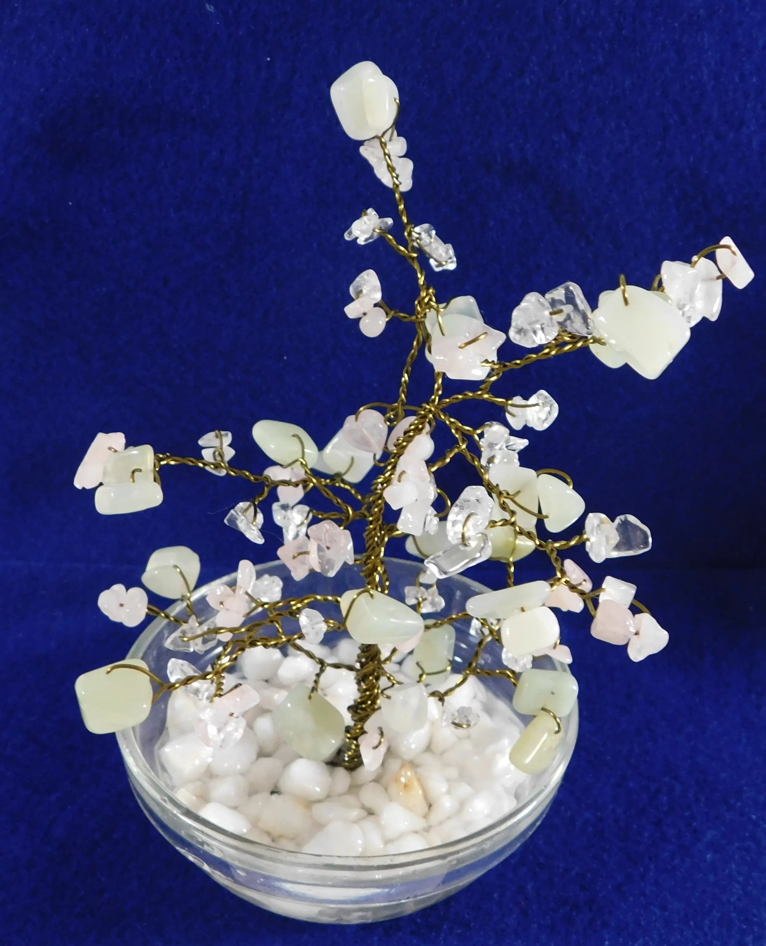 Gemstone bonsai tree with blue background 