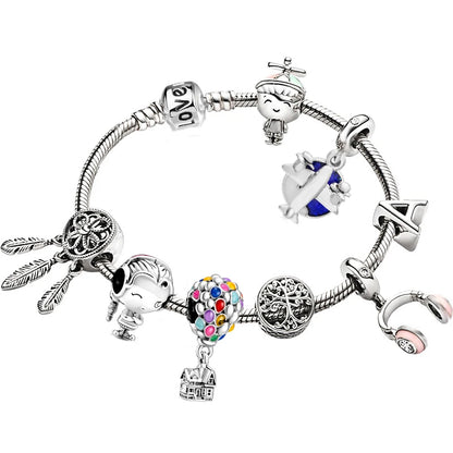 a bracelet with charms and charms on it