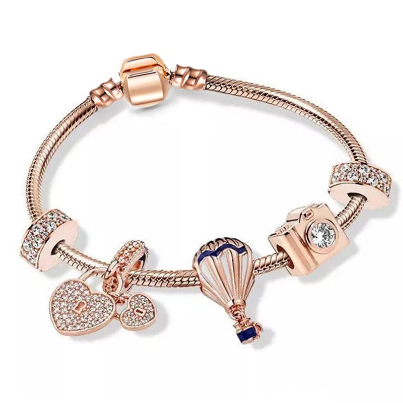 a bracelet with charms and a heart