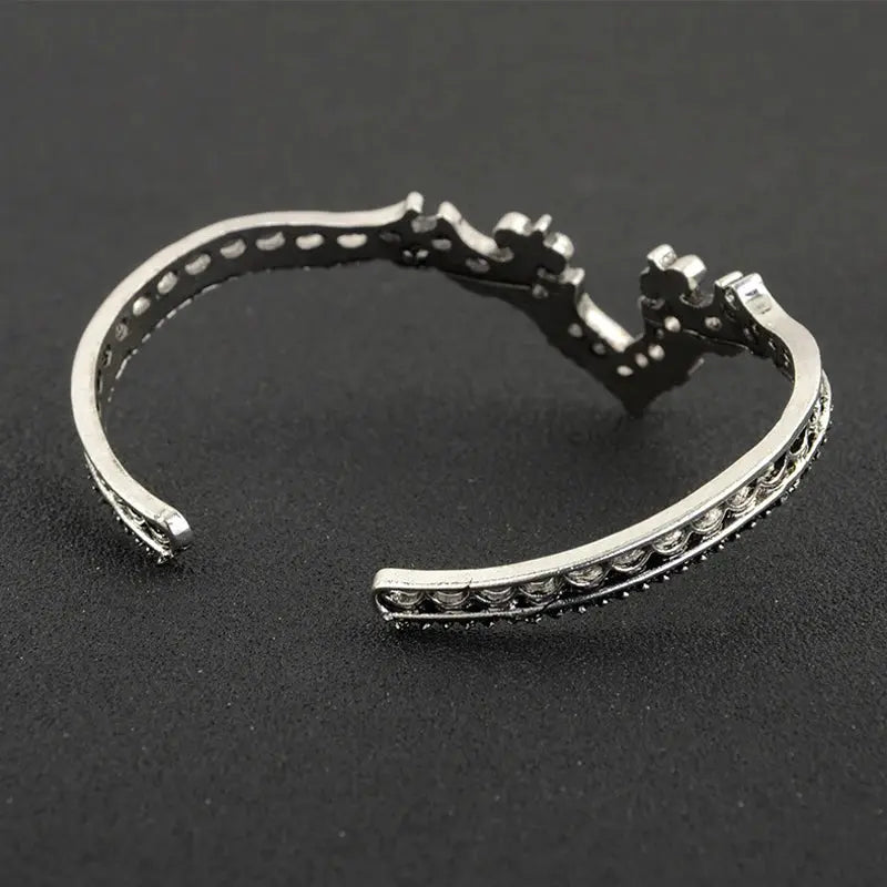 Vintage Tribal Cuff Bracelet - Beautifully crafted adjustable bangle with ethnic carvings, perfect for layering.