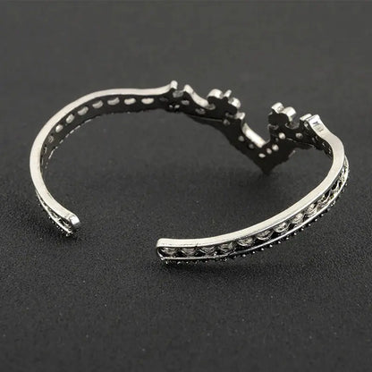 Vintage Tribal Cuff Bracelet - Beautifully crafted adjustable bangle with ethnic carvings, perfect for layering.