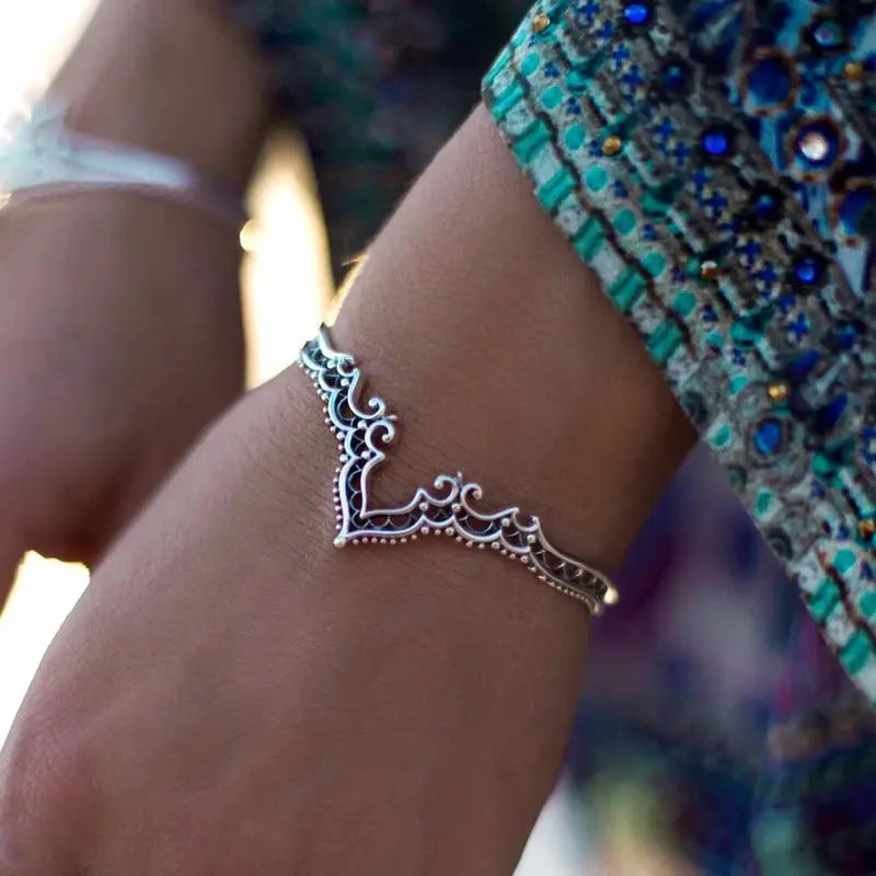 Vintage Tribal Cuff Bracelet - Adjustable bangle showcasing exquisite tribal patterns, ideal for versatile styling.