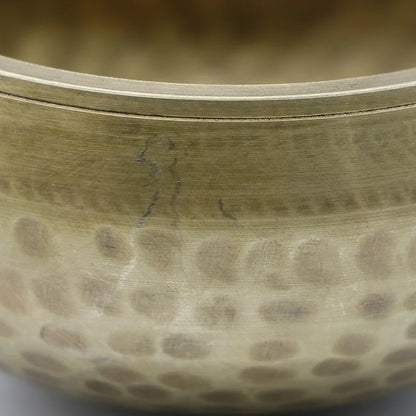 a close up of a bowl on a table