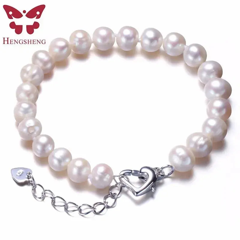 a bracelet with a heart charm on it