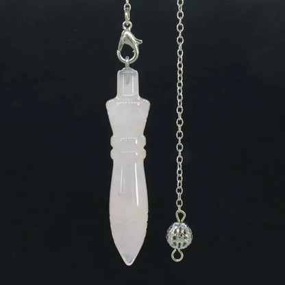 Healing Crystal Pendulum with 7 Chakra Stones - Vibrant display of the pendulum against a serene backdrop for spiritual healing.