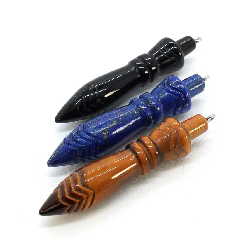 Healing Crystal Pendulum with 7 Chakra Stones - Image of the pendulum being held, demonstrating its use in meditation and dowsing.