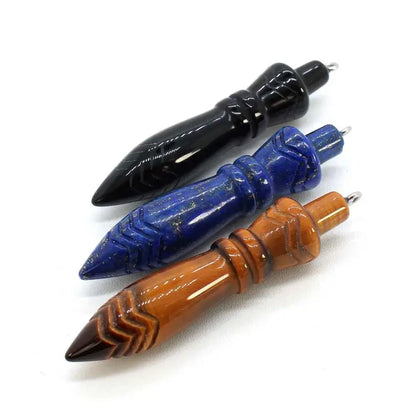 Healing Crystal Pendulum with 7 Chakra Stones - Image of the pendulum being held, demonstrating its use in meditation and dowsing.