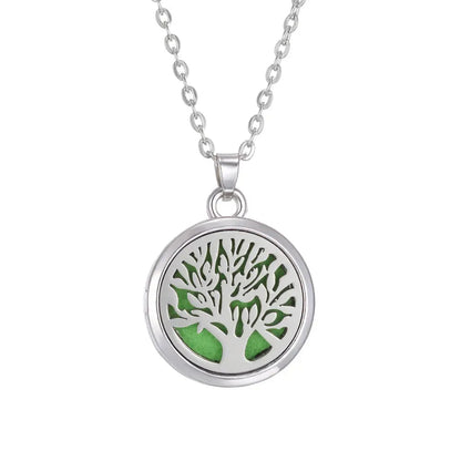 Elegant display of the Tree of Life stainless steel aroma necklace, perfect for aromatherapy enthusiasts - Tree of Life Aromatherapy Necklace