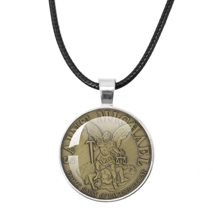 St. Michael Archangel Protection Necklace - Divine Shield Pendant on a leather background to enhance texture.