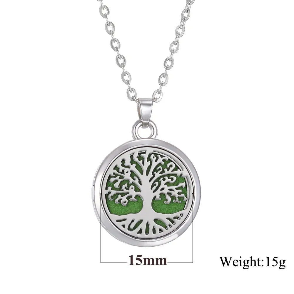 Essential oils being added to the Tree of Life Aromatherapy Necklace, perfect for personal scent - stainless steel aroma necklace