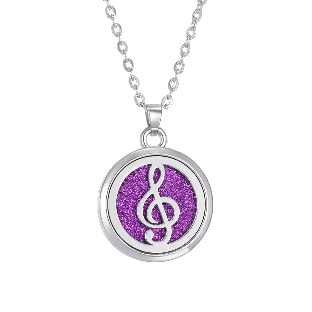 A women’s fashion accessory, the Tree of Life Stainless Steel Aroma Necklace styled with casual attire - stainless steel aroma necklace