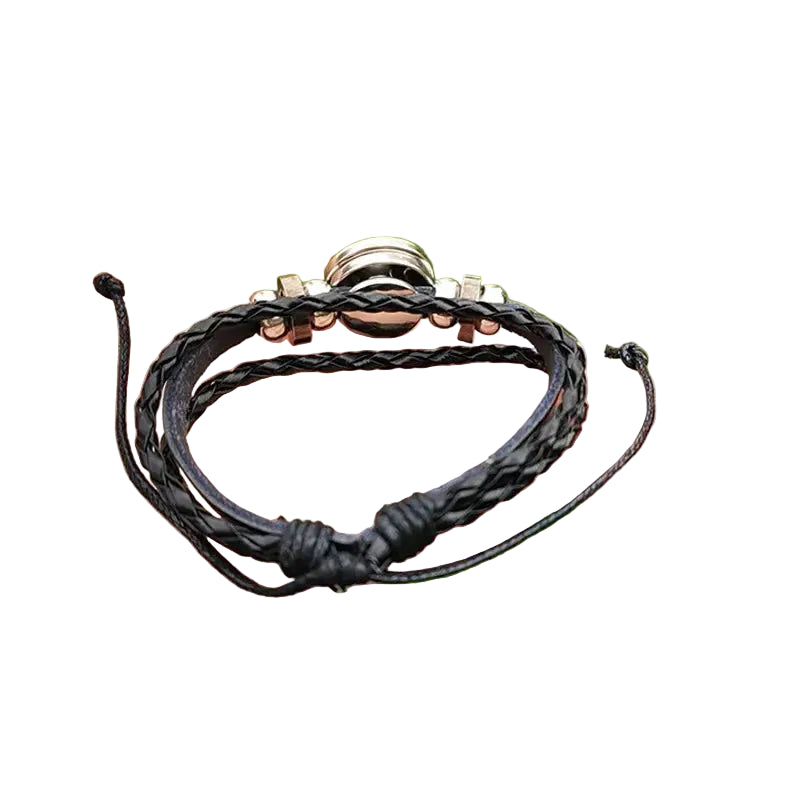 Close-up view of the 18mm glass dome charm on the Metatron Cube Sacred Geometry Bracelet, showcasing detailed sacred geometry patterns.