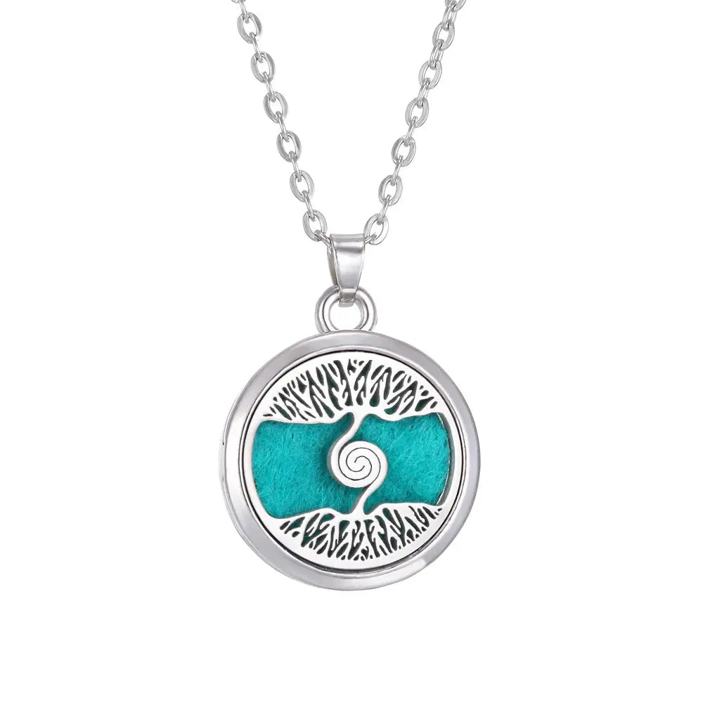Close-up of the Tree of Life Aromatherapy Necklace showcasing its stainless steel locket for essential oil diffusion - stainless steel aroma necklace