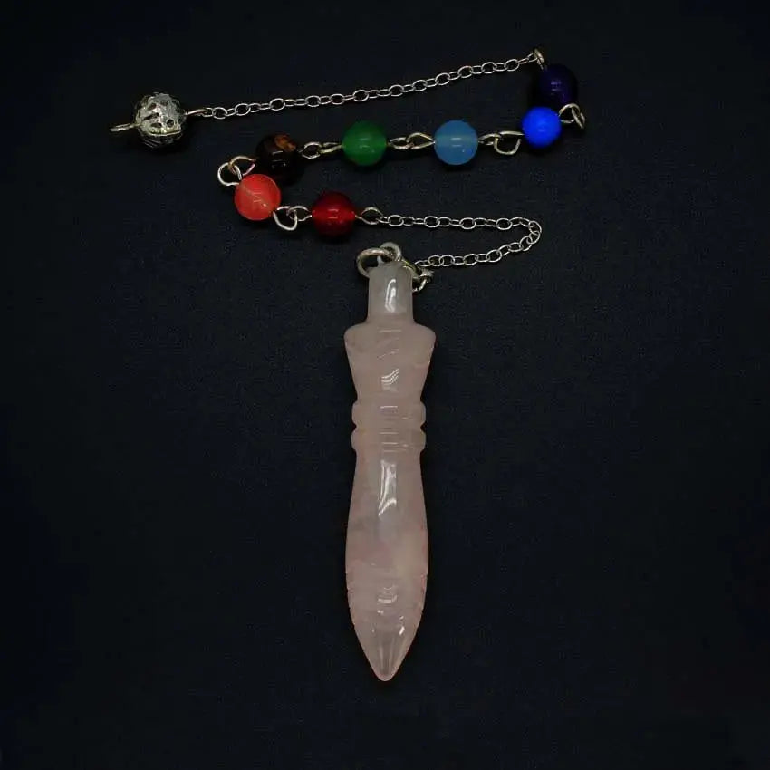 Healing Crystal Pendulum with 7 Chakra Stones - Visual showcasing the pendulum as a spiritual accessory, highlighting its elegance and function.