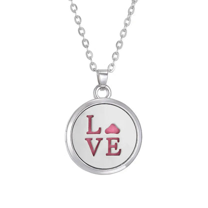 Elegant Tree of Life design on stainless steel aroma necklace for essential oils and perfumes - Tree of Life Aromatherapy Necklace