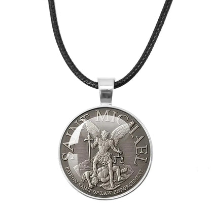St. Michael Archangel Protection Necklace - Divine Shield Pendant displayed on a wooden background.