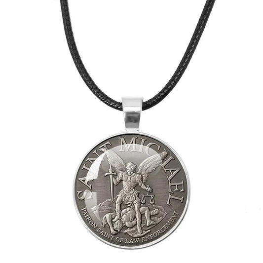 St. Michael Archangel Protection Necklace - Divine Shield Pendant displayed on a wooden background.