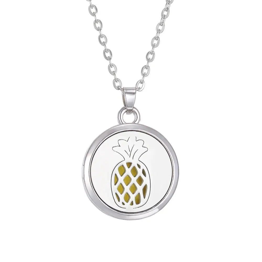 The stunning Tree of Life design on a stainless steel aroma necklace suitable for perfume and essential oils - Tree of Life Aromatherapy Necklace