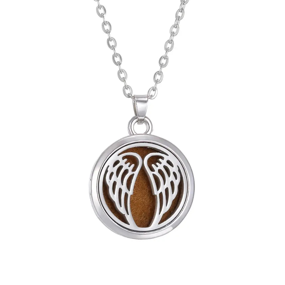 A women’s essential accessory, the Tree of Life stainless steel aroma necklace shown in a stylish setting - stainless steel aroma necklace