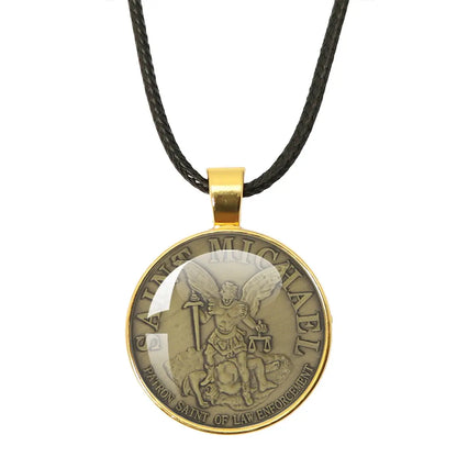 St. Michael Archangel Protection Necklace - Divine Shield Pendant highlighted with a blurred background of nature.