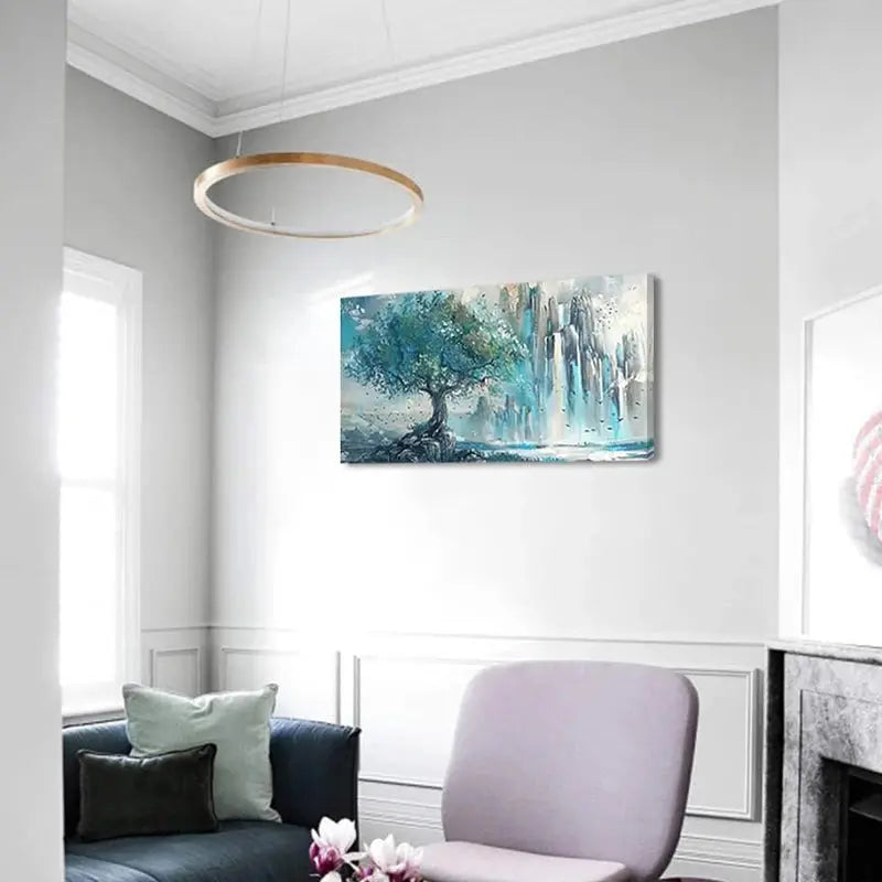 Sophisticated turquoise mountain wall art in a modern living room, featuring a tree and vibrant nature elements.